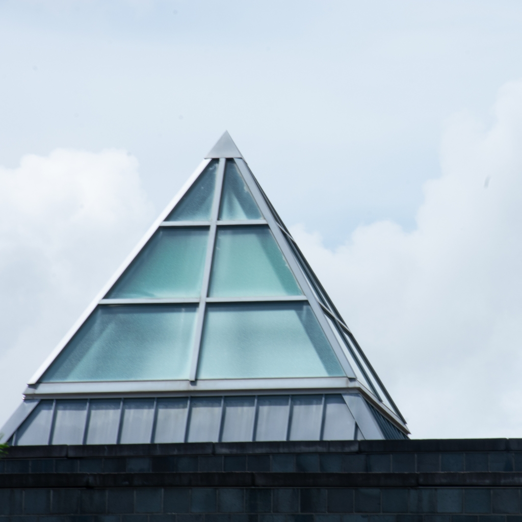 Triangle shaped window on building exterior